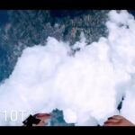 skydiving through the clouds